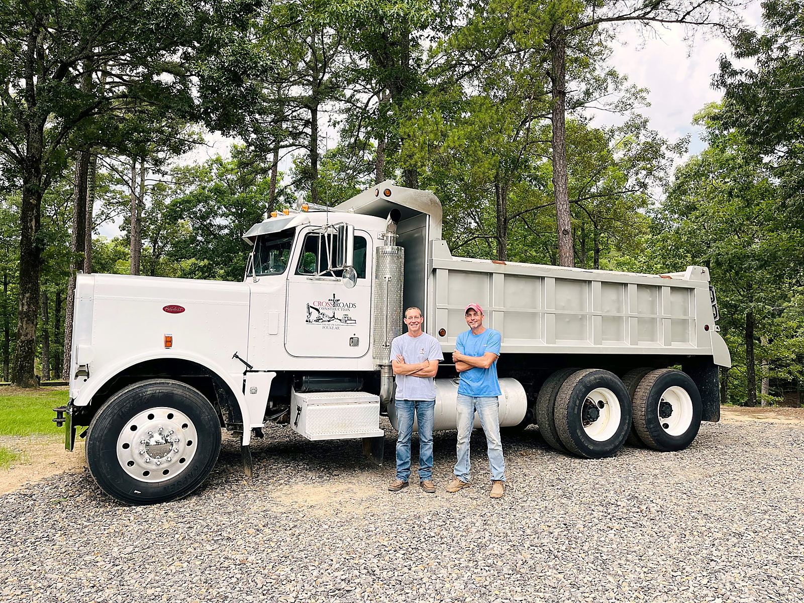 Jason Knight and Jason Greer with their dump truck