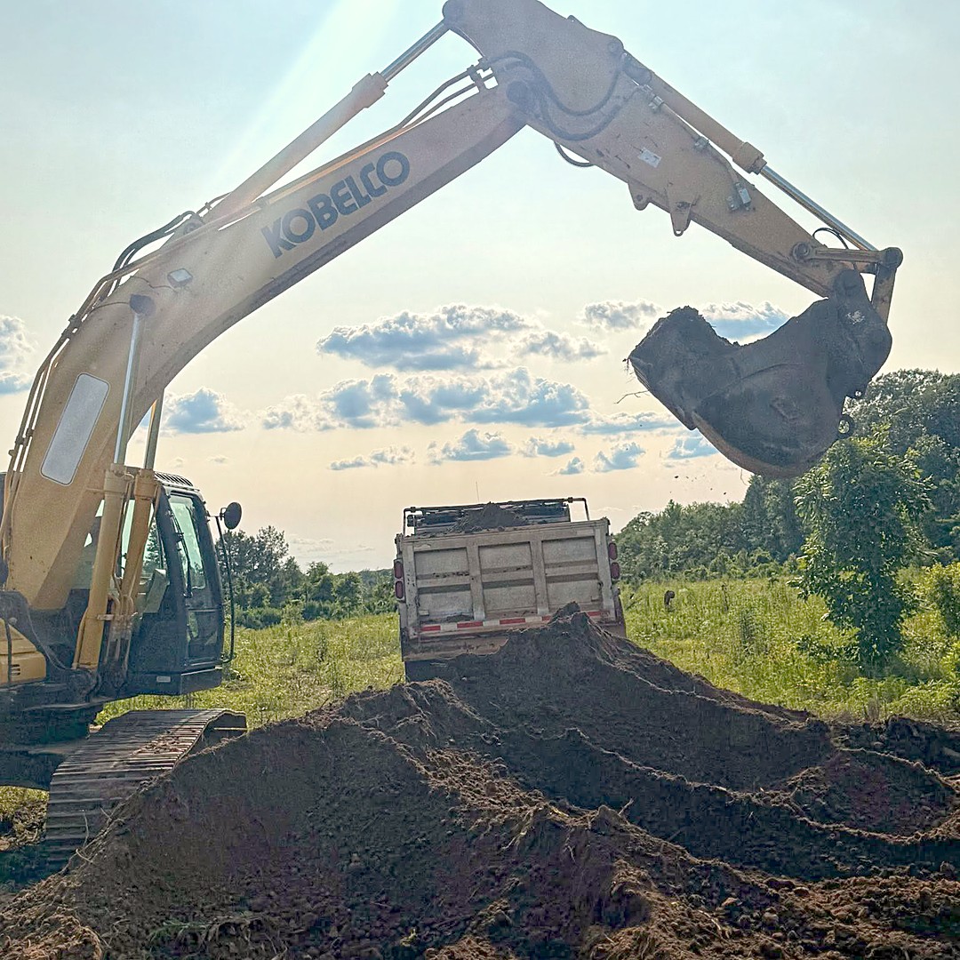 Pond dig, spoil loaded out — Genoa AR