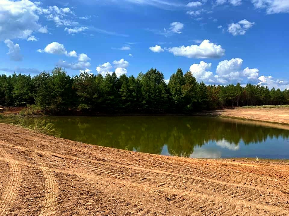 Finished pond dug by CrossRoads Construction