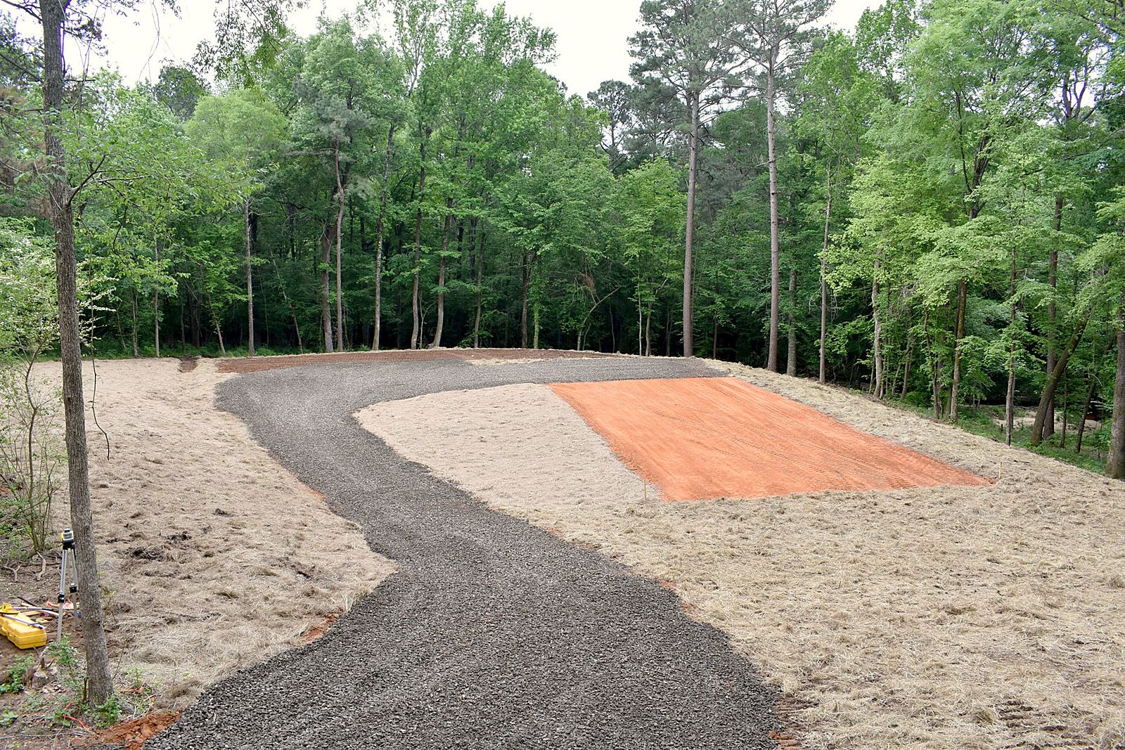 Gravel road wound through the timber
